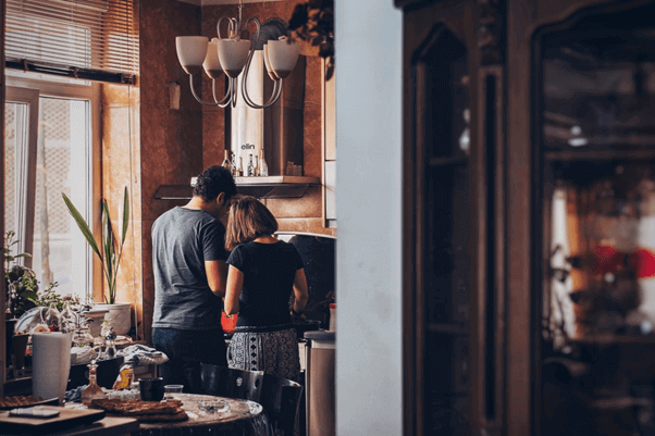 couple cooking in a kitchen