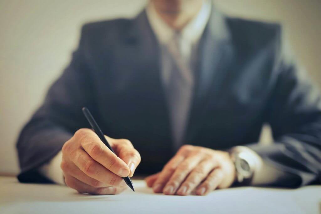 businessman-signing