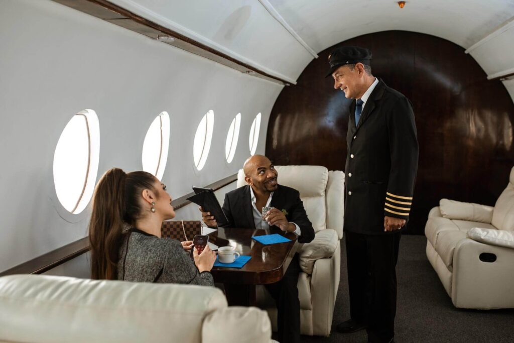 Flight attendant speaking to passengers