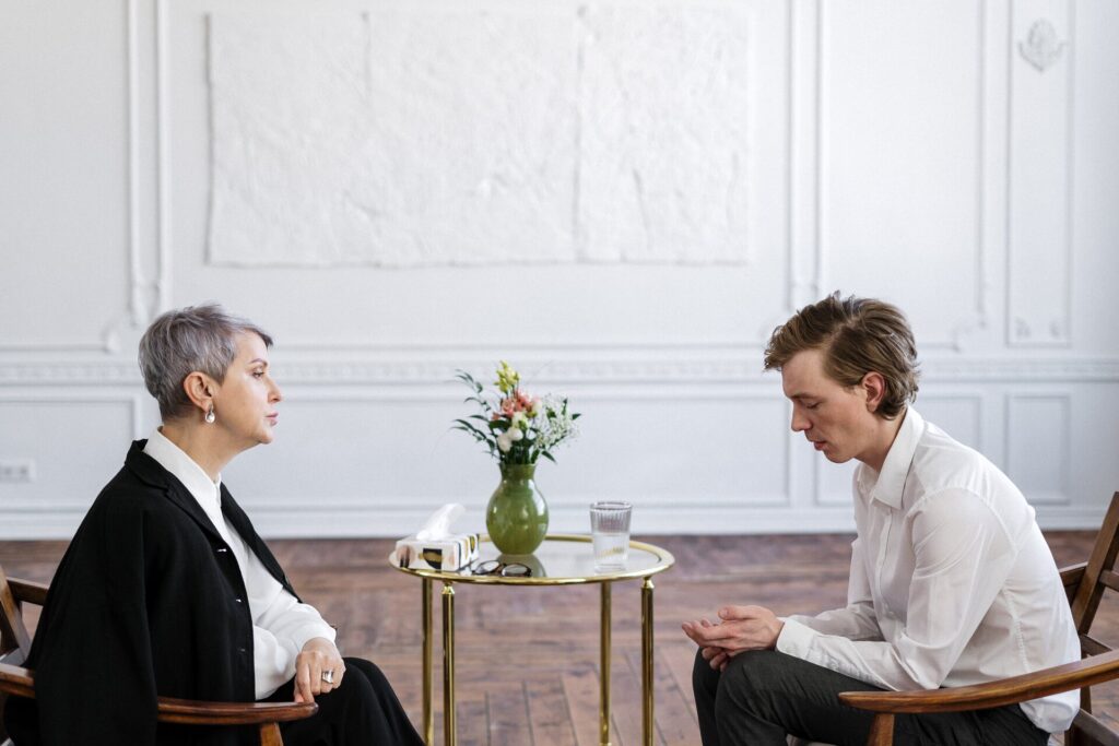 A man talking to a therapist