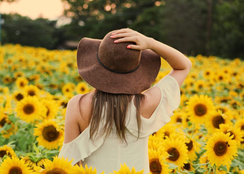 A woman in the sunflower field