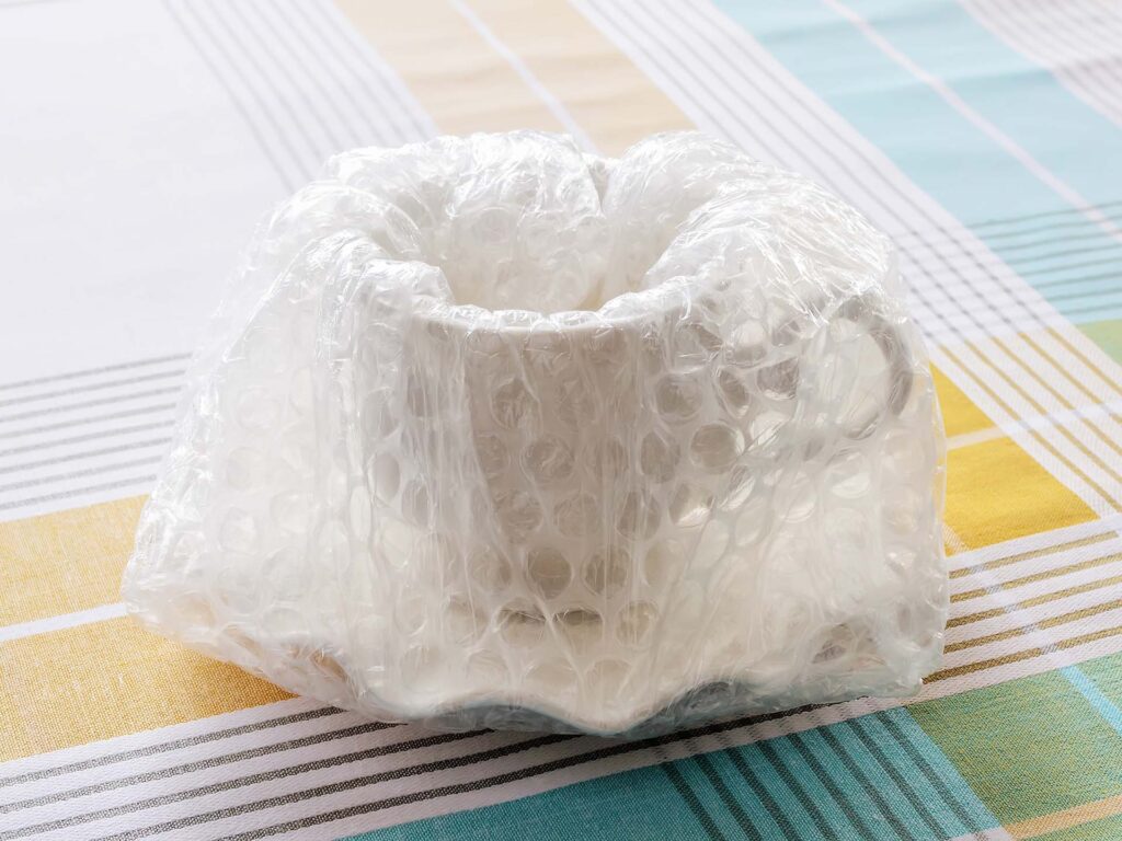 A cup wrapped in bubble wrap